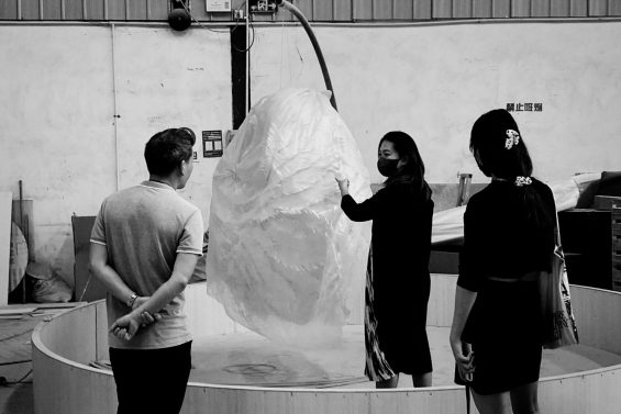 Checking the phoenix prototype in the factory for Jackie Wen's exhibition