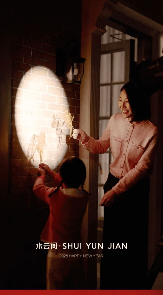 Lv ai and her daughter playing with light for the chinese new year