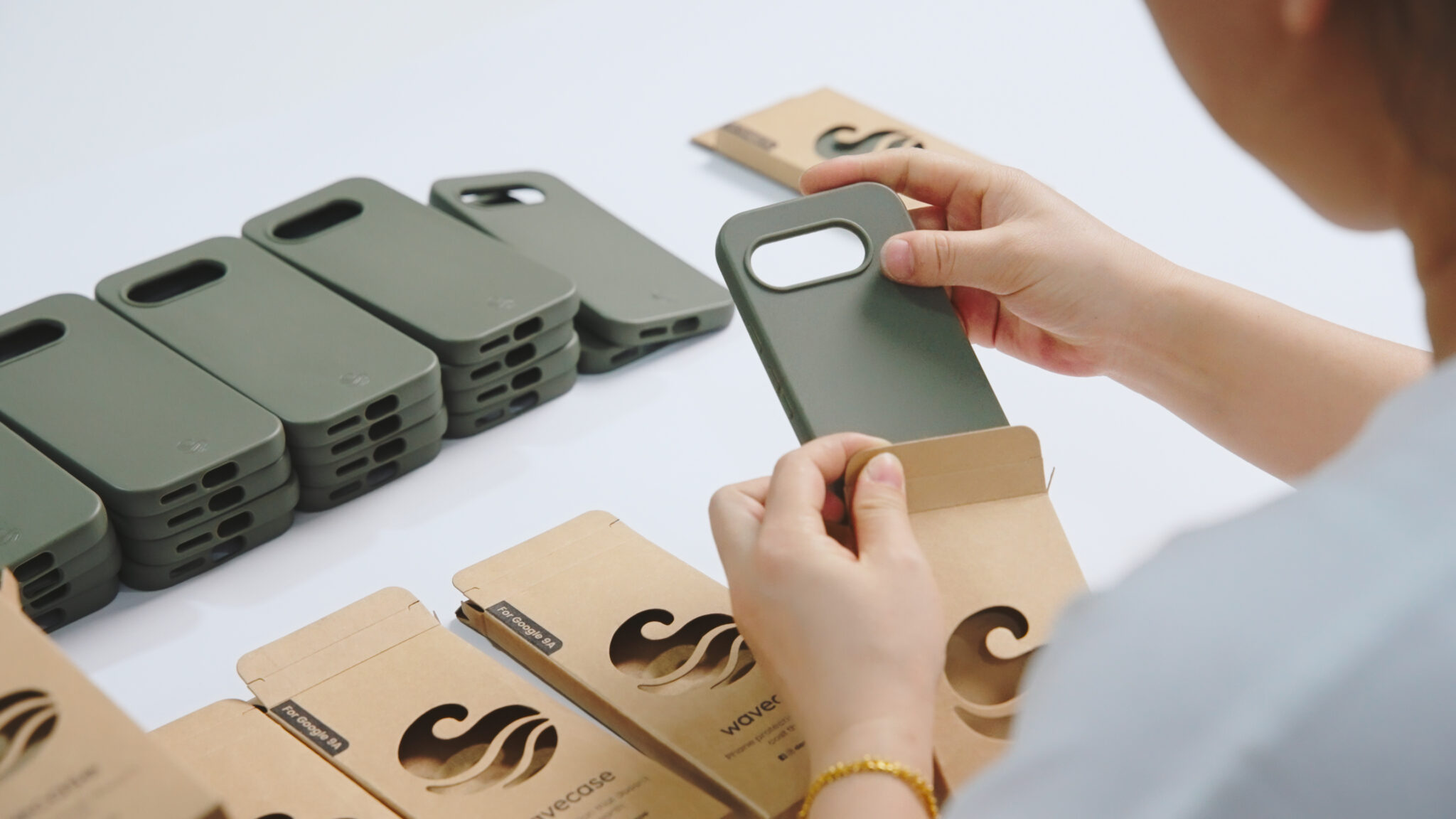 Factory photo and video for Design by Wave, a phone case and screen protector company from the U.K