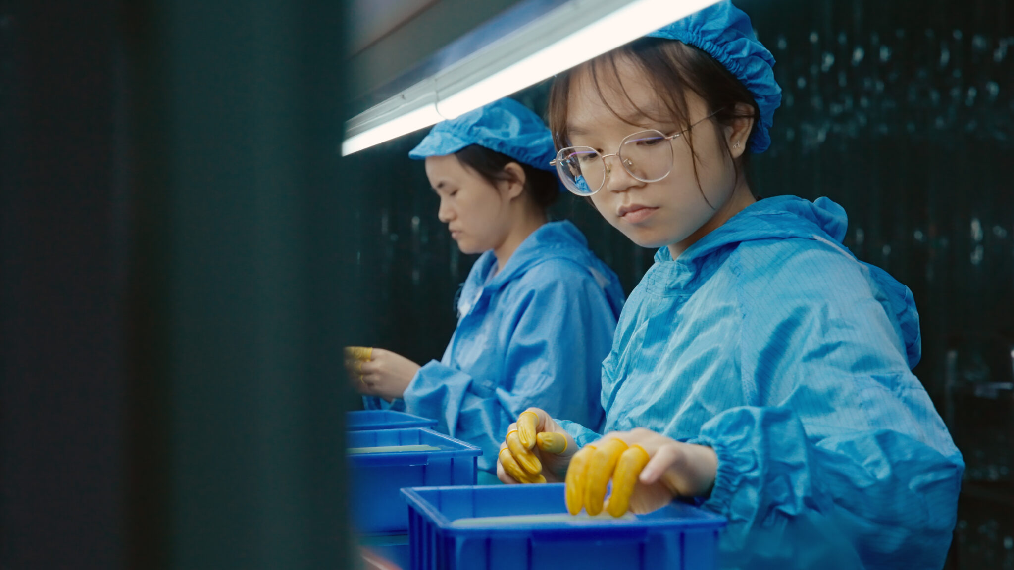 Factory photo and video for Design by Wave, a phone case and screen protector company from the U.K