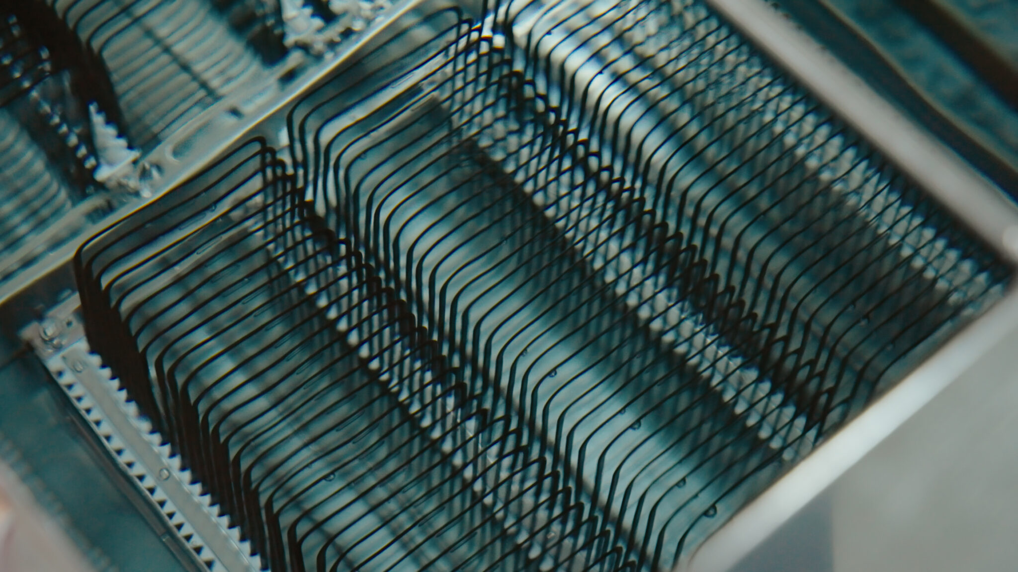 Factory photo and video for Design by Wave, a phone case and screen protector company from the U.K