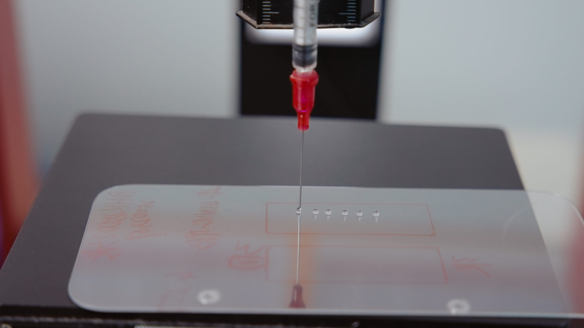 Factory photo and video for Design by Wave, a phone case and screen protector company from the U.K