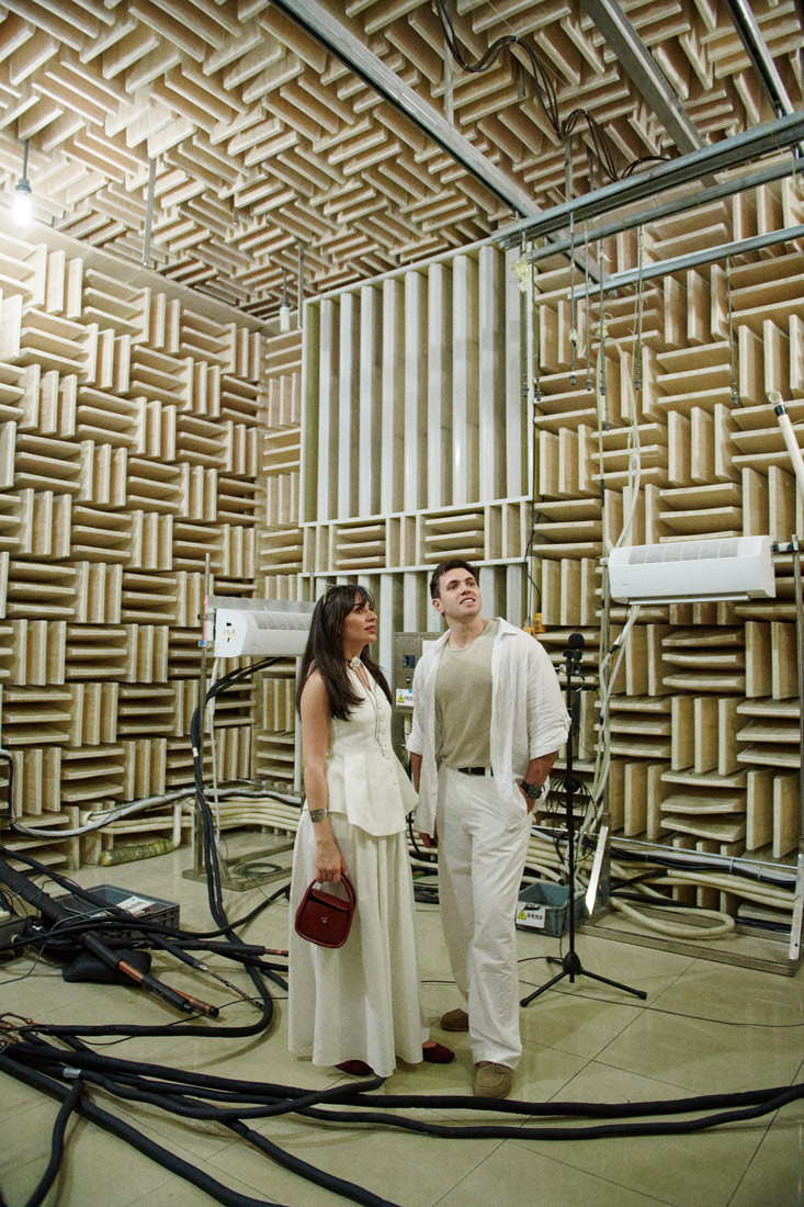 Soleen Mohammed & Riaan Barnard check a sound-checking room inside of Midea's factory.
