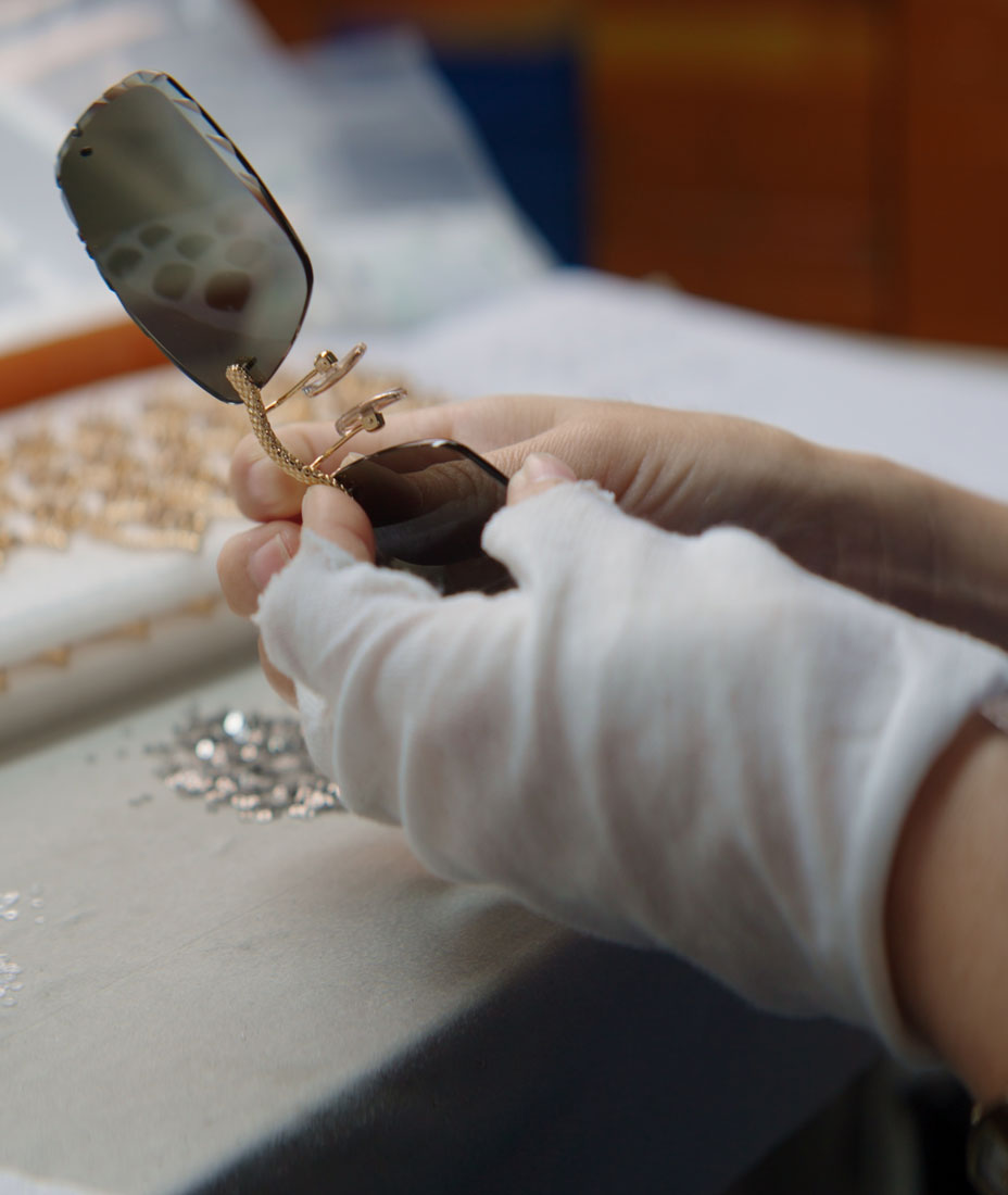 Close-up of James Oro titanium eyewear, highlighting gold frame textures and craftsmanship.