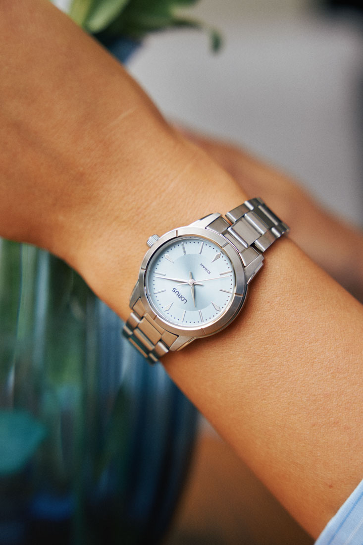 Macro product photography of Lorus wristwatches highlighting polished stainless steel textures and dial craftsmanship by ITR Visuals.