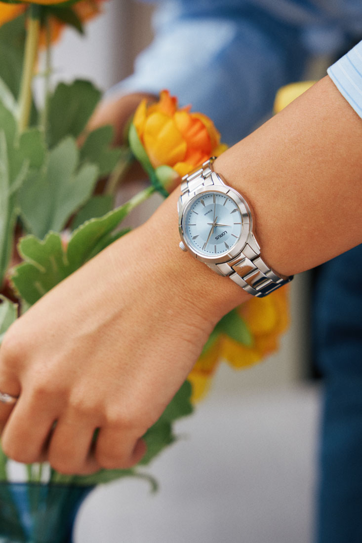 Macro product photography of Lorus wristwatches highlighting polished stainless steel textures and dial craftsmanship by ITR Visuals.