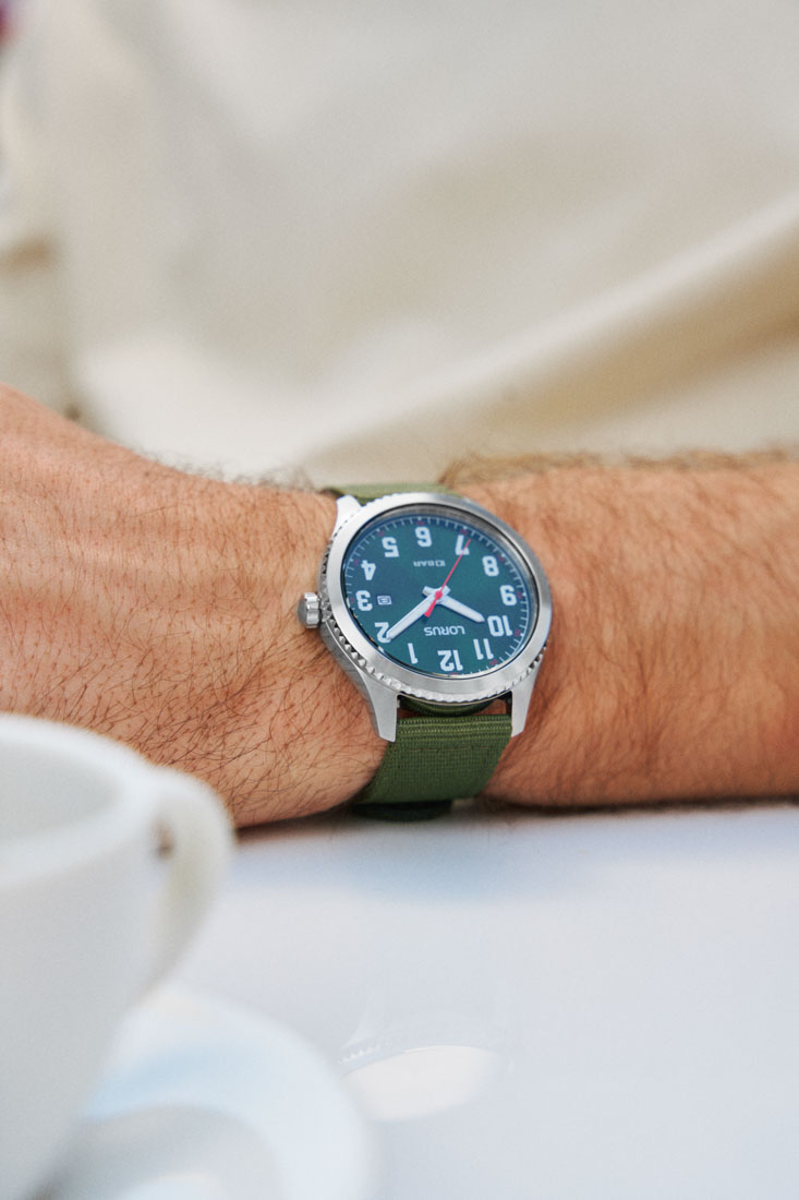 Macro product photography of Lorus (Seiko sub-brand) wristwatches highlighting polished stainless steel textures and dial craftsmanship by ITR Visuals.